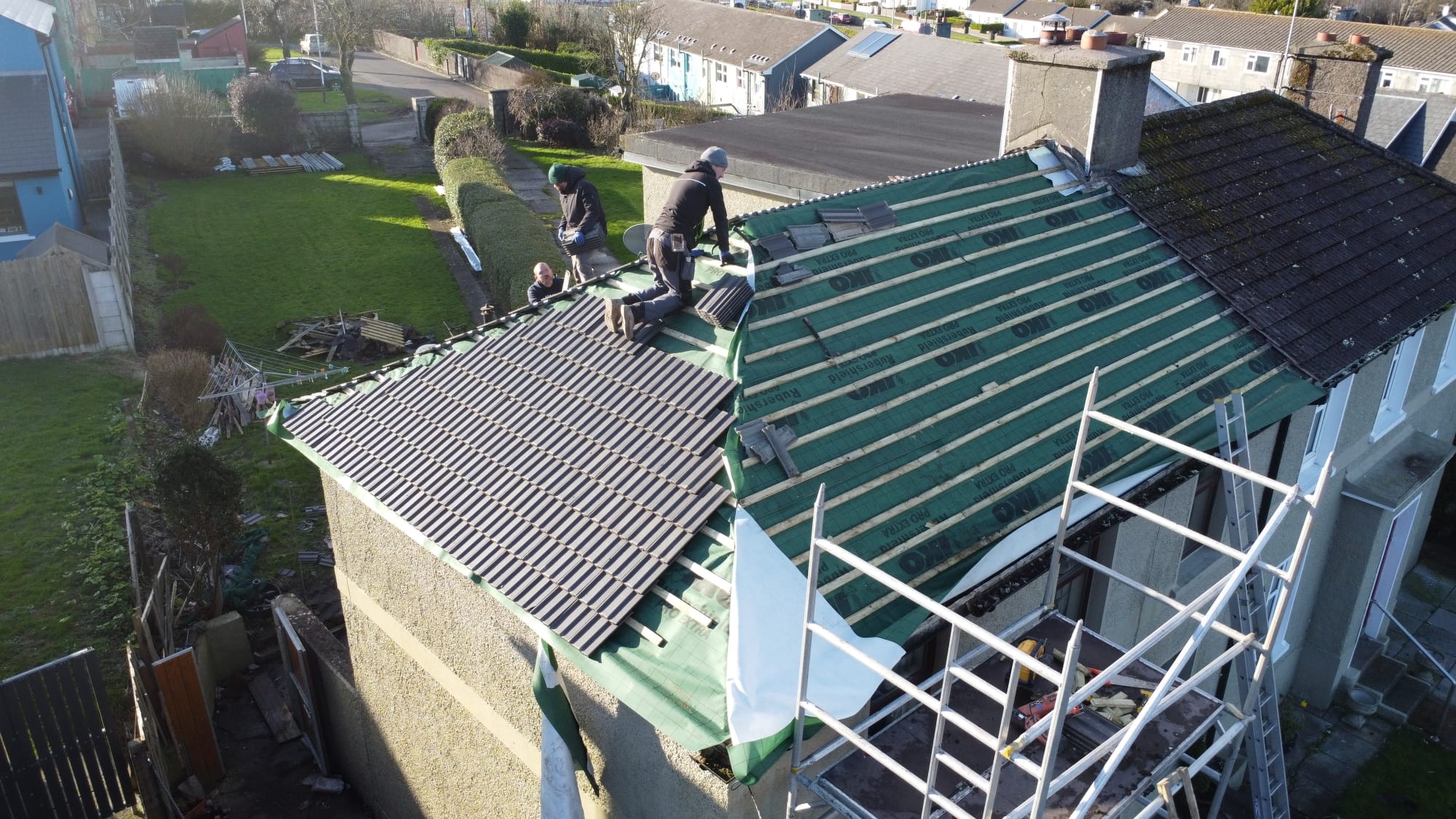 Tidy, protected work area on an Overhaul Roofing job site