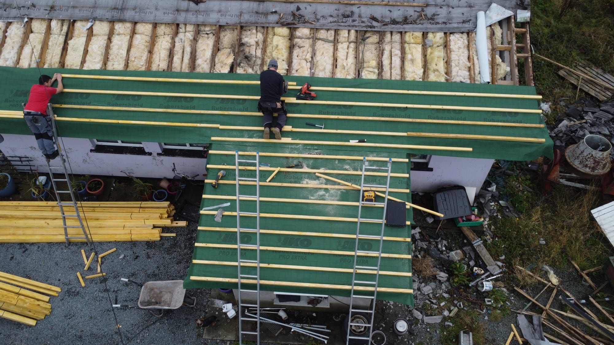 Overhaul Roofing team member inspecting a roof in Cork