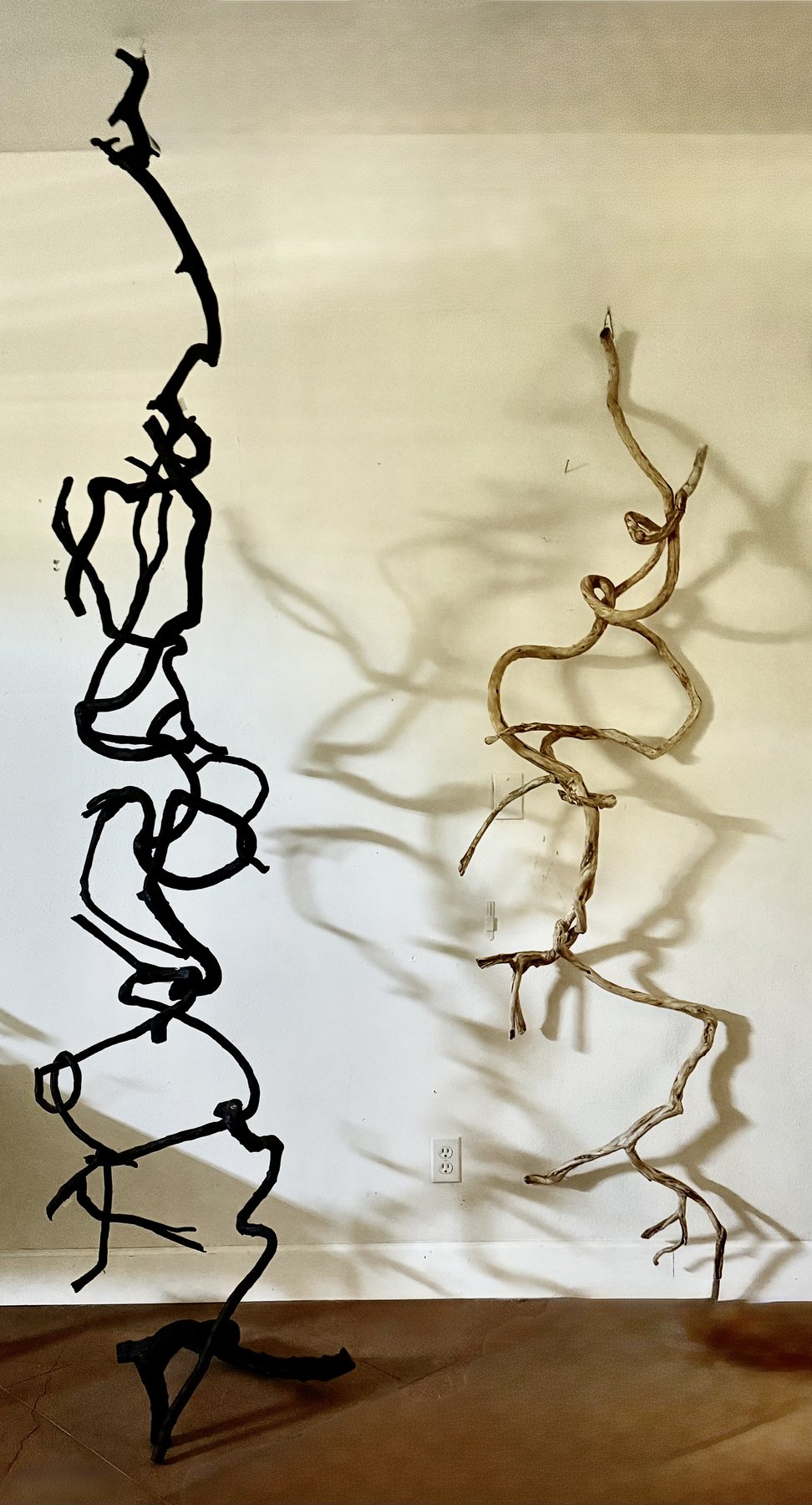 Scribble, a looping line of pale wood