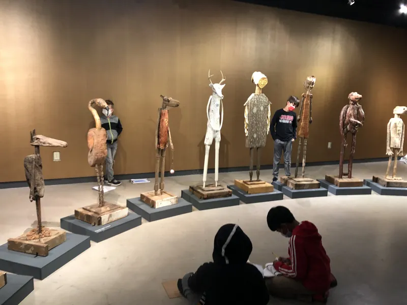 A child looking up at the guardians