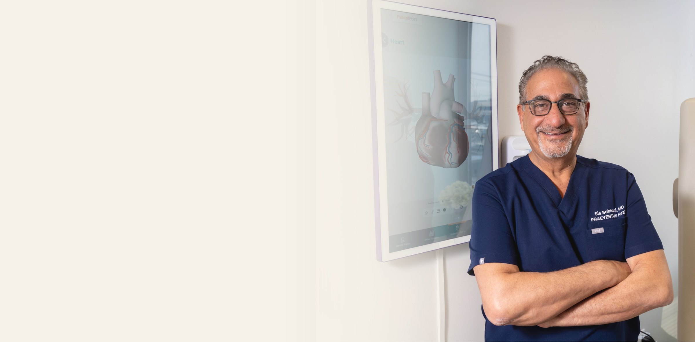 Sia Sobhani, MD in the exam room at Praeventus Health, Tysons