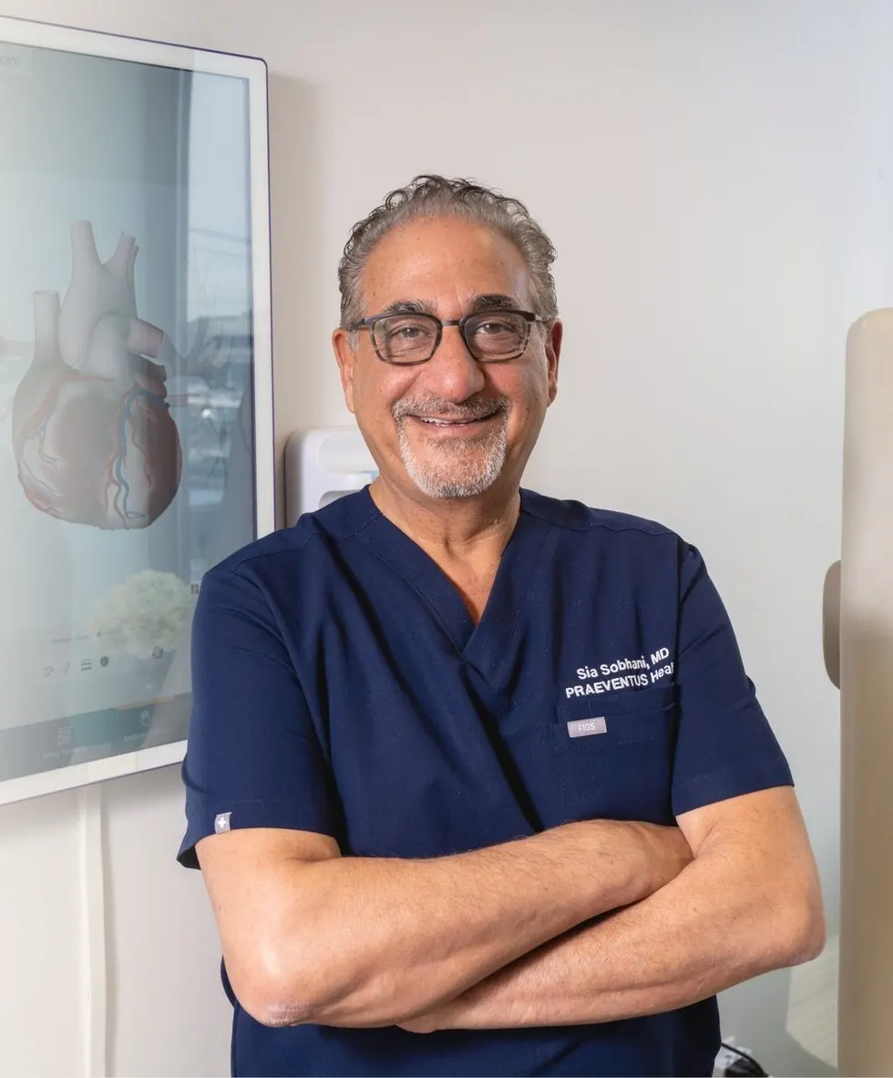 Sia Sobhani, MD in the exam room at Praeventus Health, Tysons