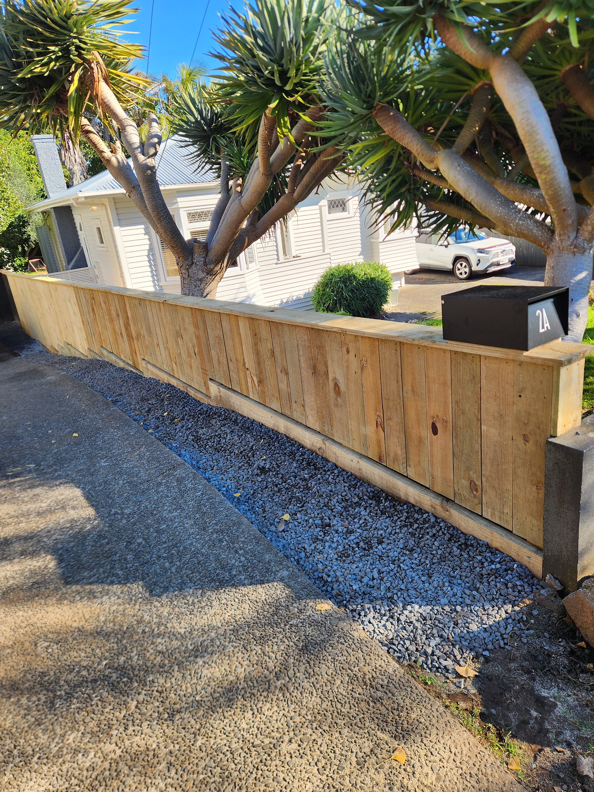New timber retaining wall and fence built at a Central Auckland villa