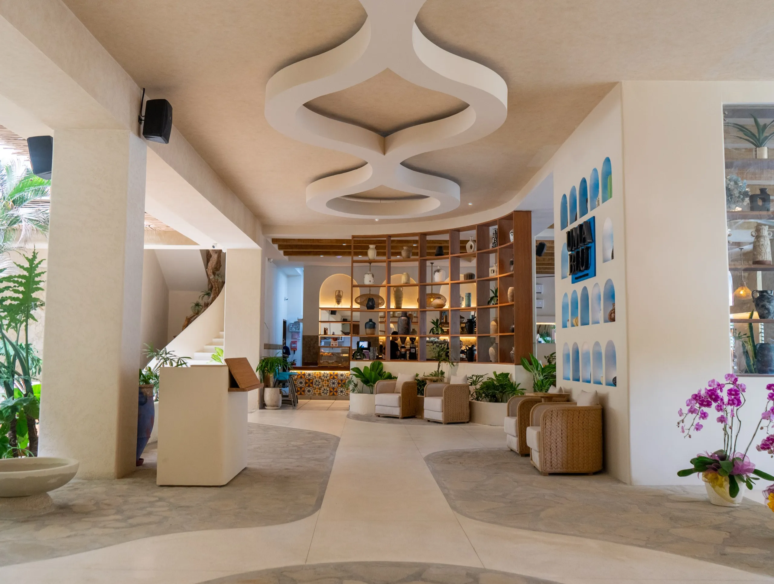 Bookshelves and seating in the lobby library