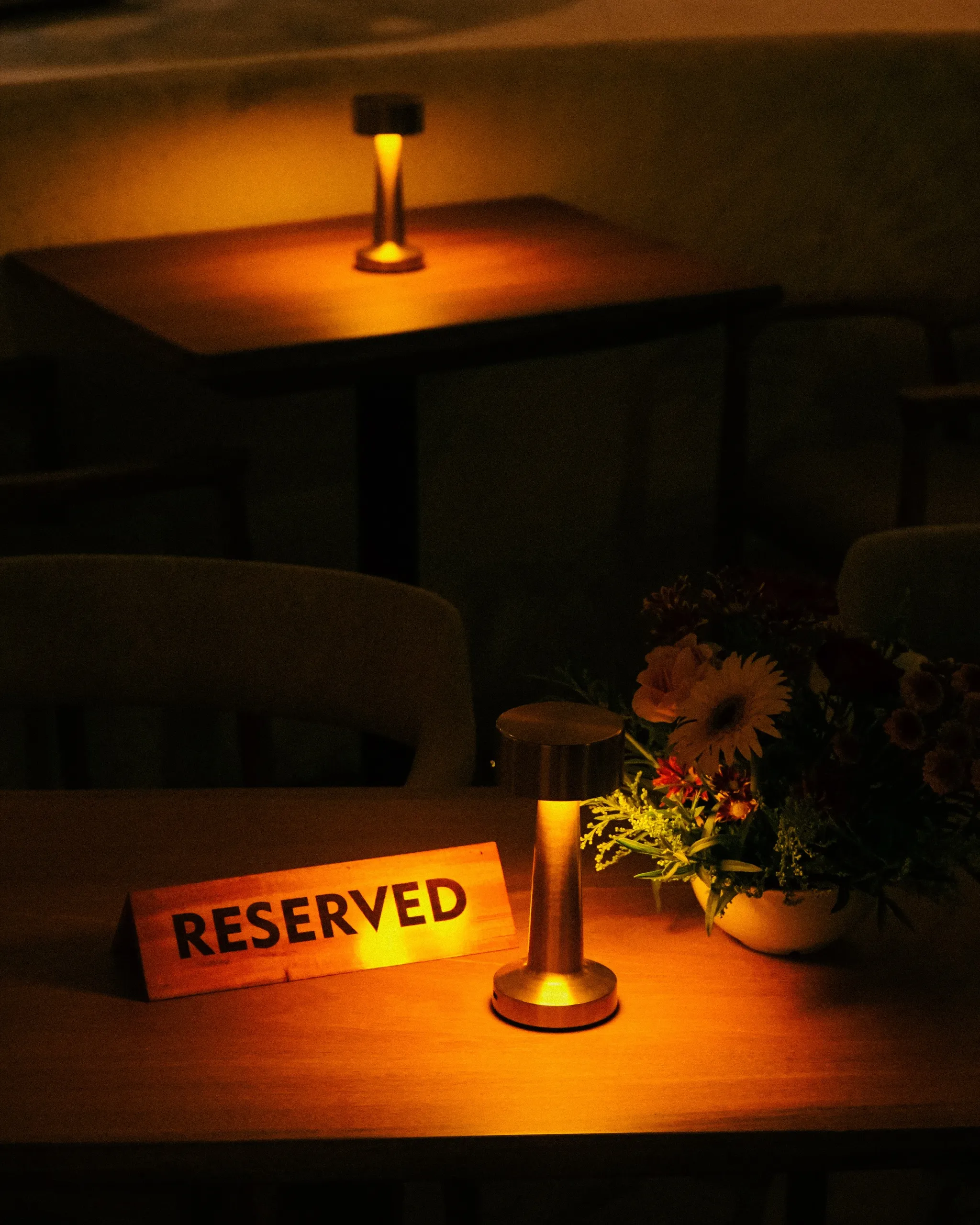 Table set for dinner by lamplight