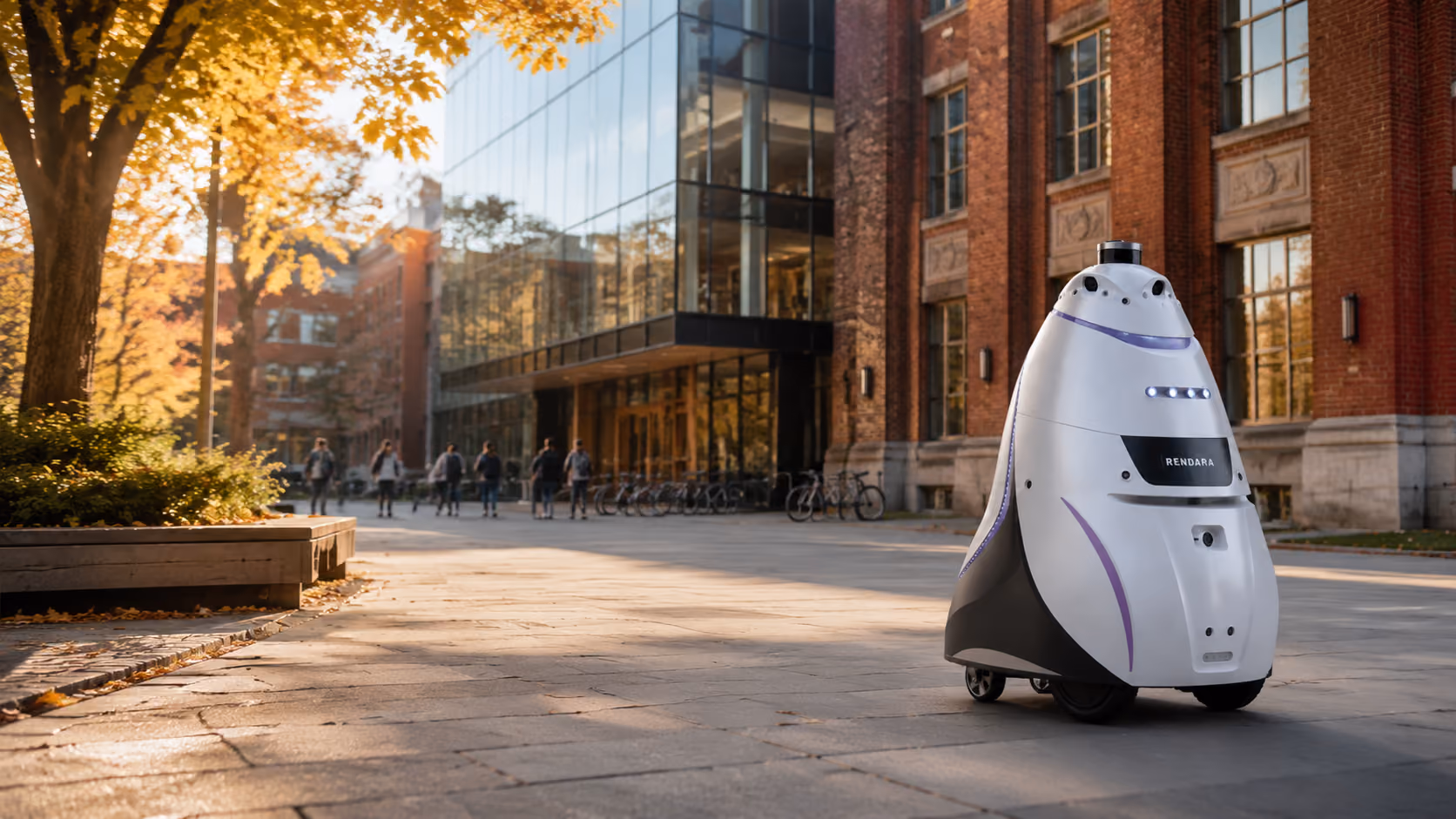 A Rendara security robot patrolling a paved walkway outside a brick campus building