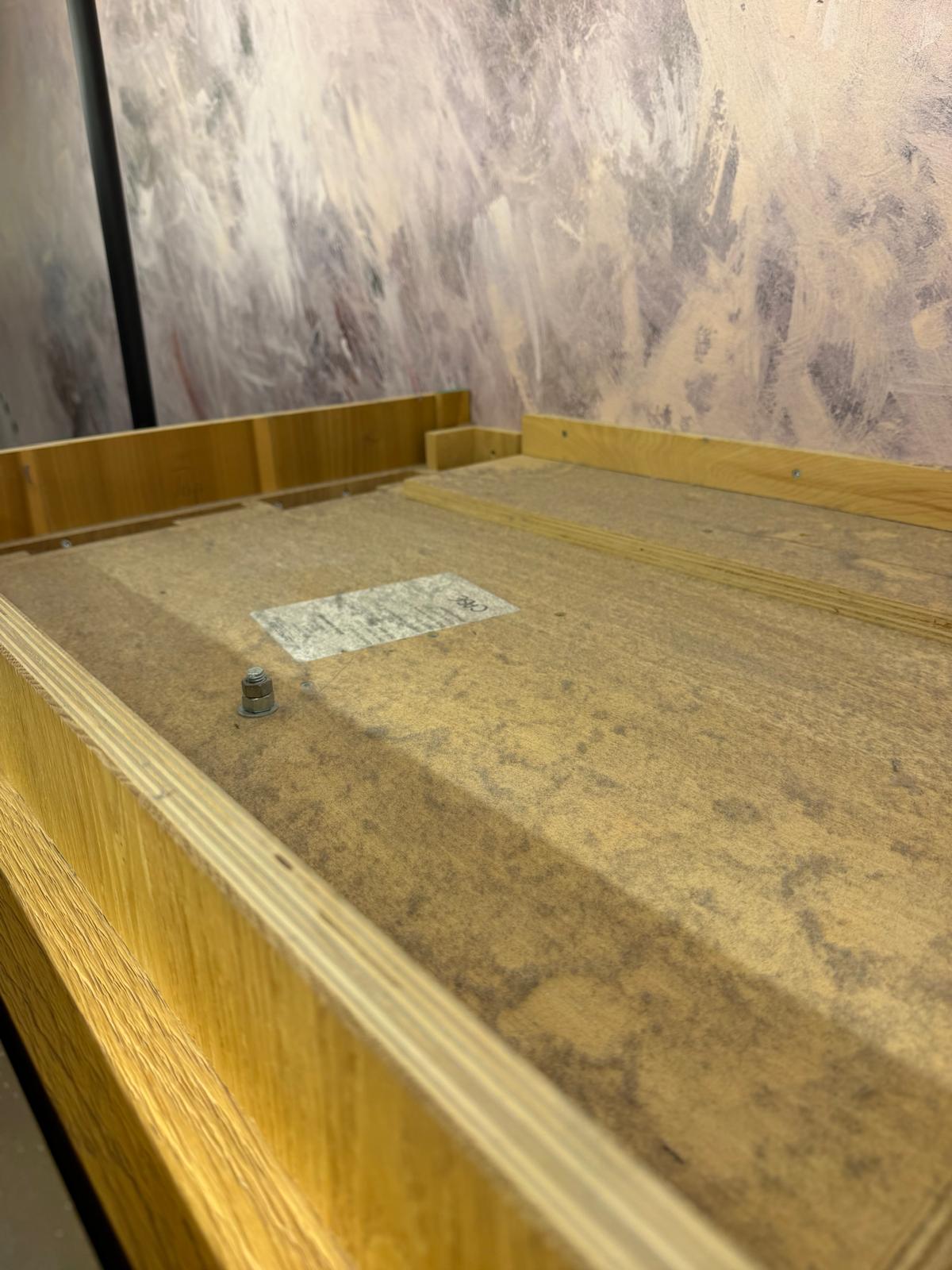 Grey dust film covering the top of an overhead timber structure before high dusting
