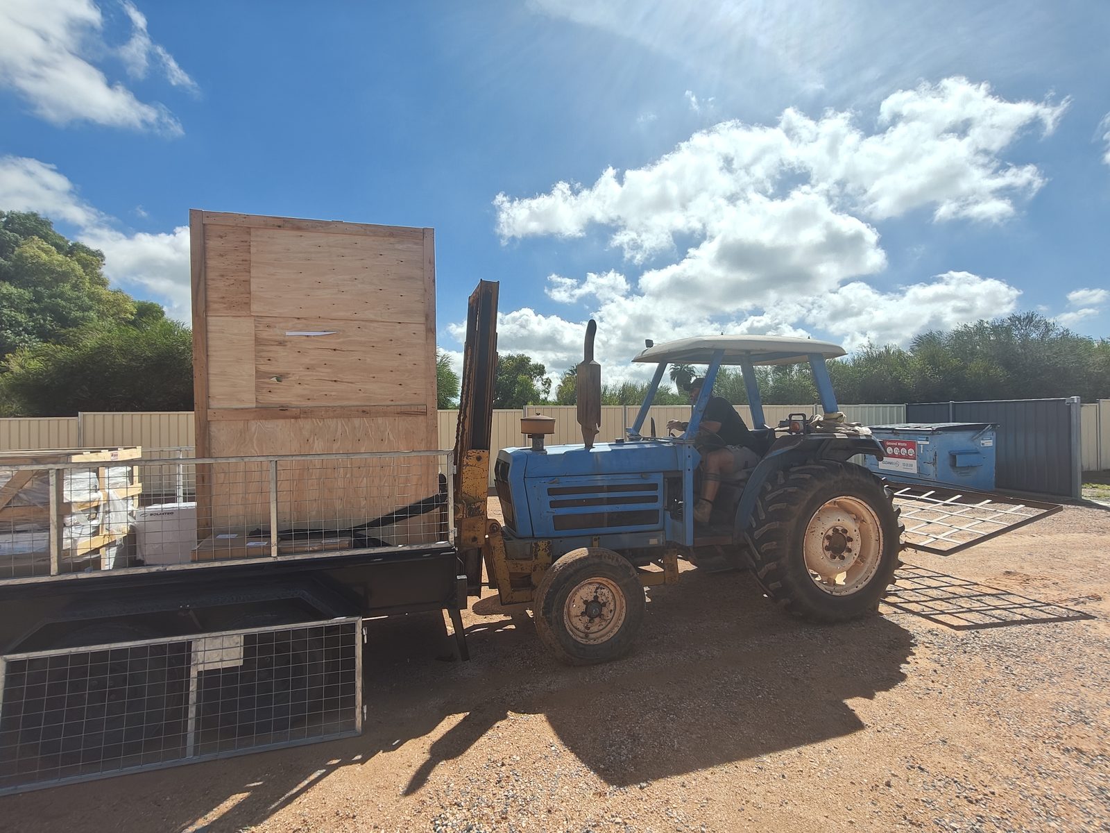 Ampaura VAST cabinet arriving crated on a farm trailer at Mildura, Victoria