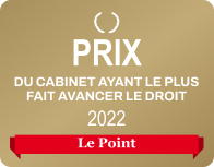 Award graphic showing a laurel wreath symbol above the text 'PRIX DU CABINET AYANT LE PLUS FAIT AVANCER LE DROIT 2022' with a red banner below reading 'Le Point'.