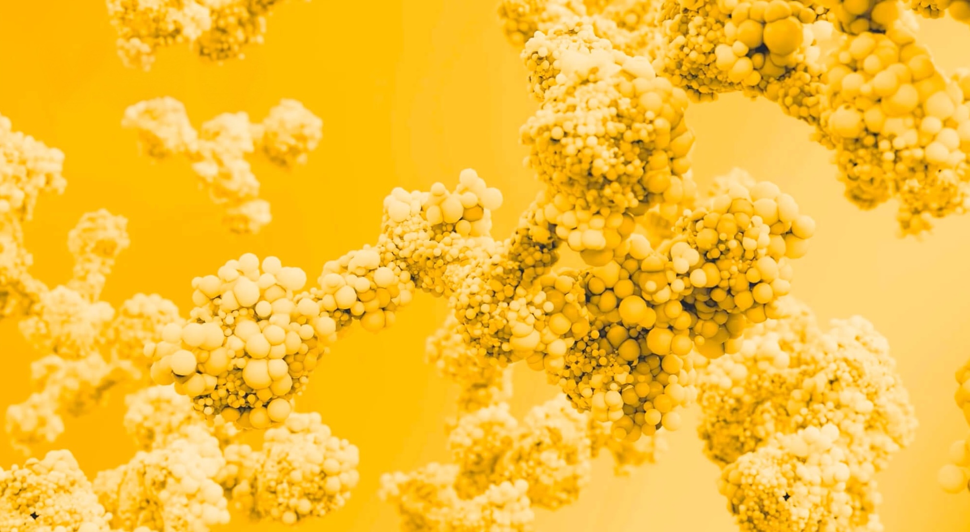 Clustered protein molecules rendered as pale spheres against an amber background