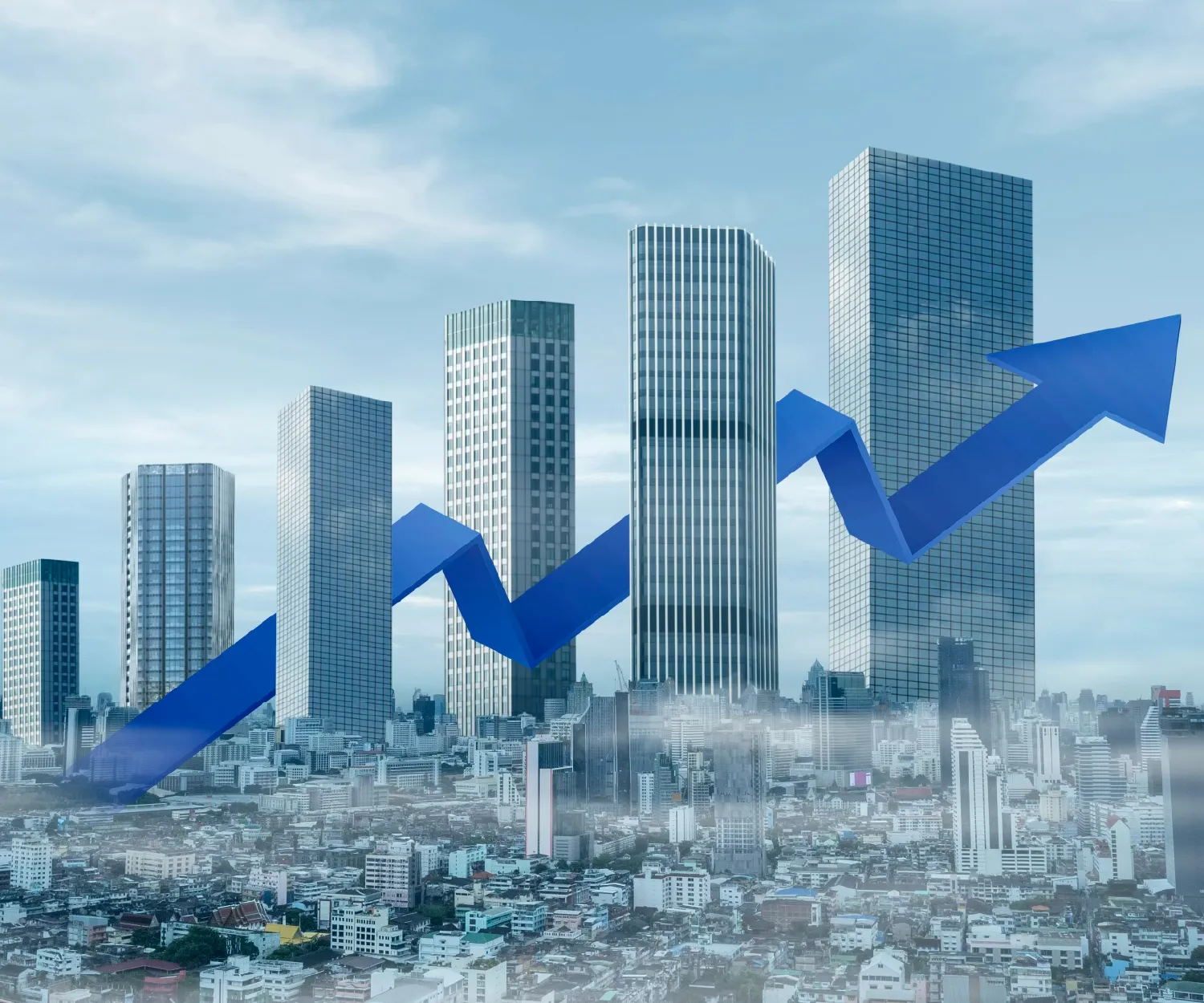 City skyline with five tall modern skyscrapers and a large blue arrow zigzagging upward across the buildings, symbolizing growth or rising trends.