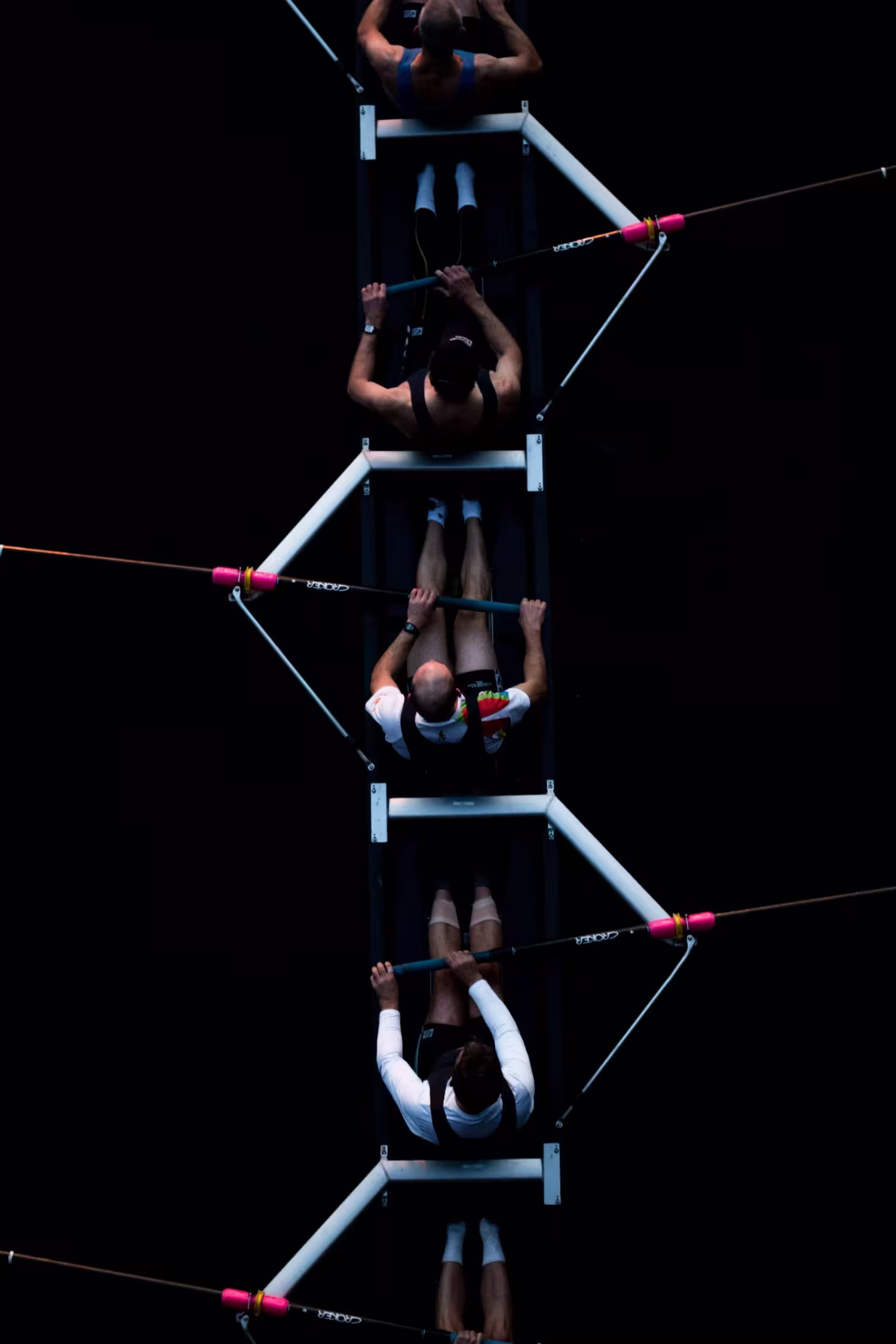 Aerial overhead view of a four-person rowing crew