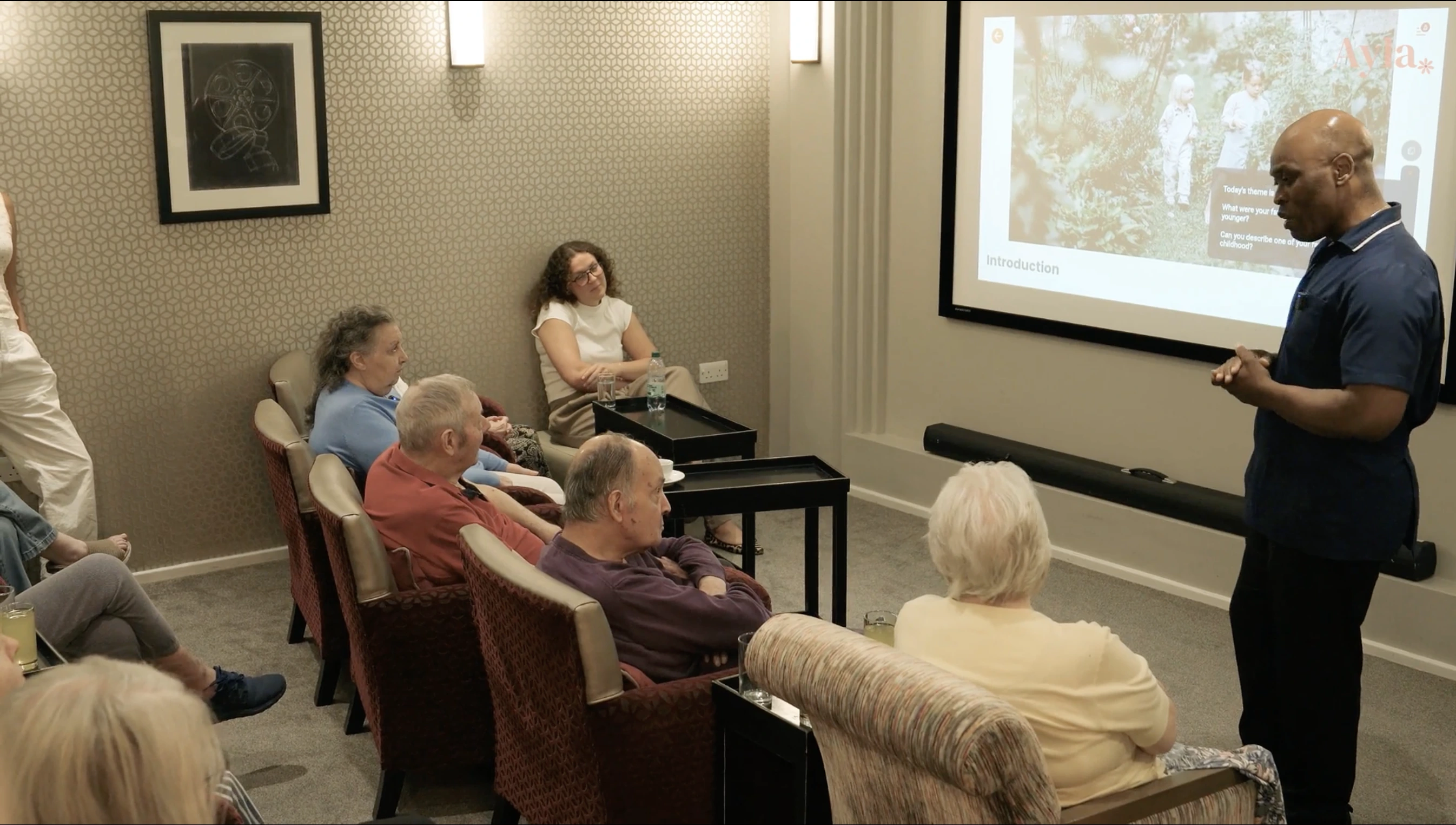 Residents taking part in a group cognitive stimulation therapy session.