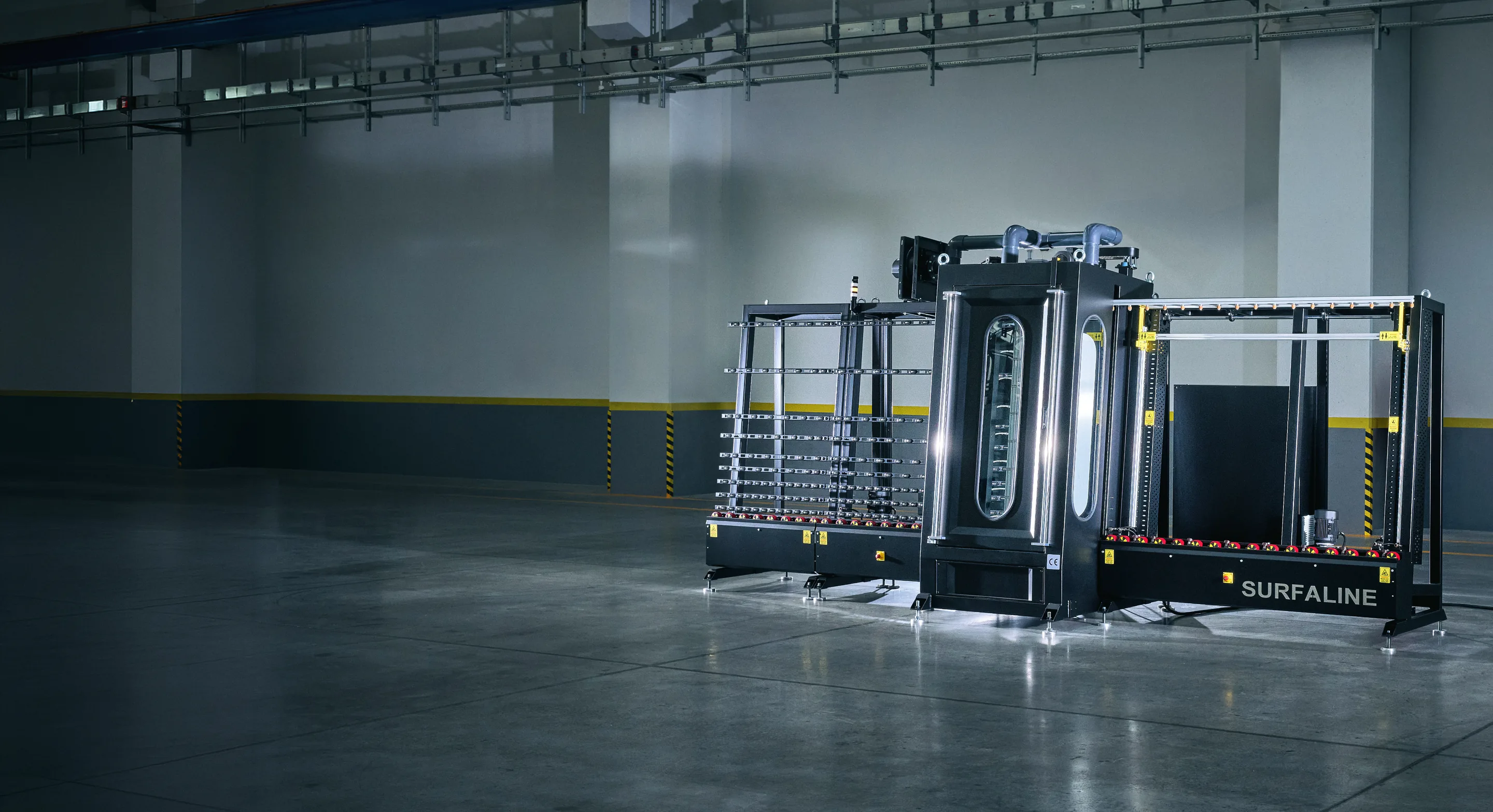SurfaLine automated glass coating machine in a production facility
