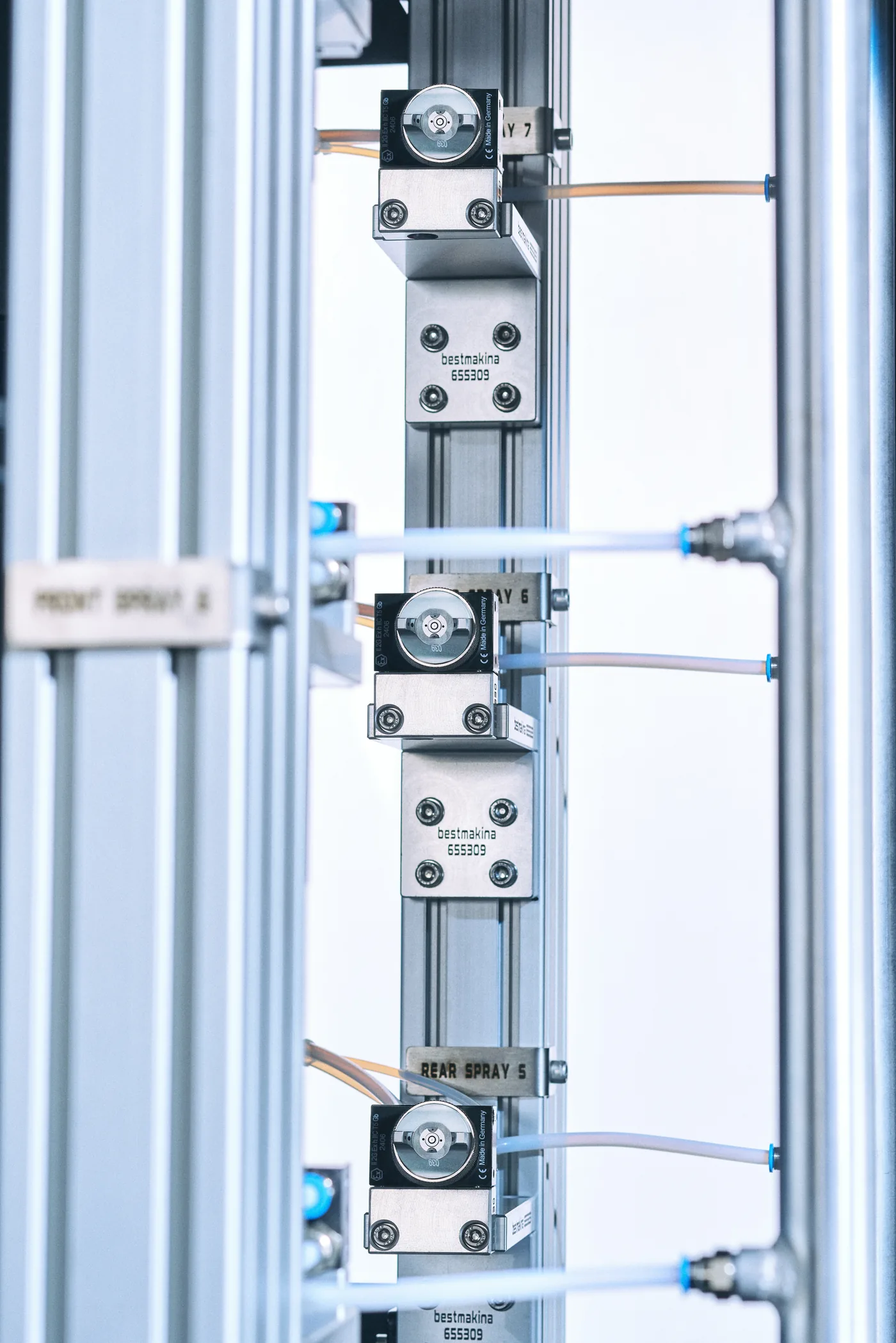 Close-up of SurfaLine applicator nozzles on the coating frame