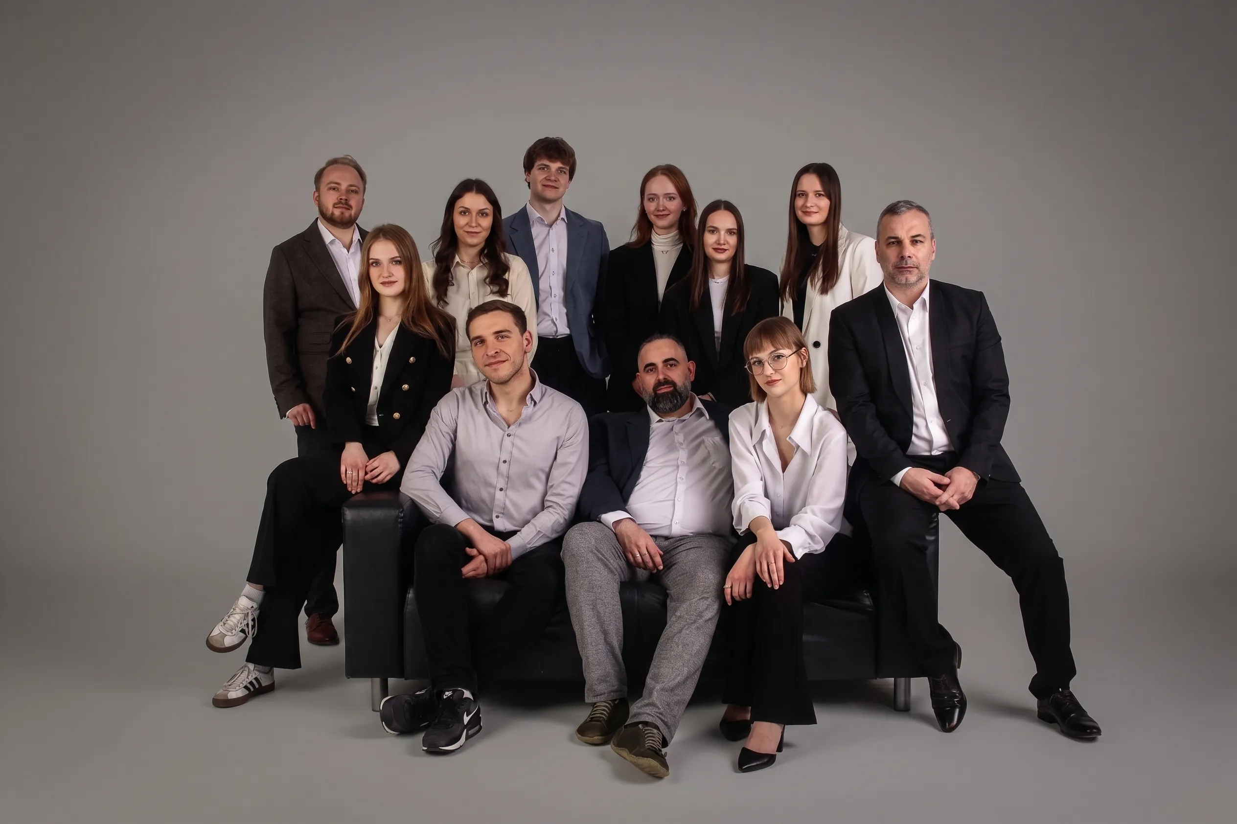 The Besides Finance team — group photo in a studio