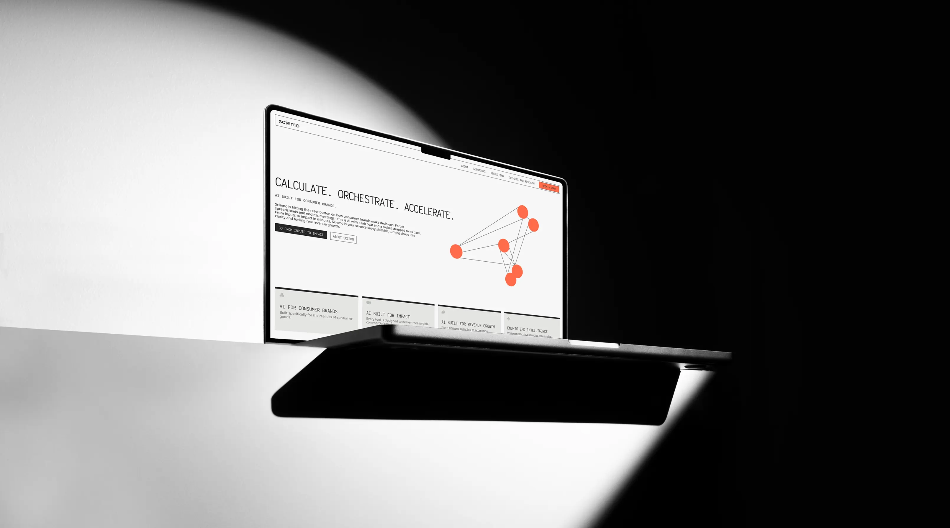 Laptop displaying Sciemo’s AI-powered R&D intelligence website.