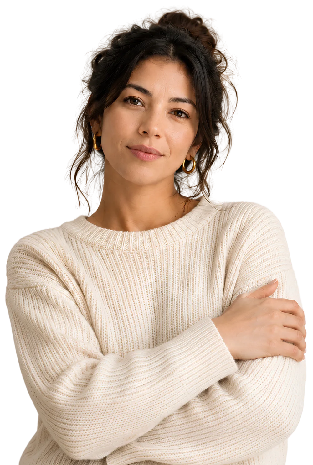 Woman with arms crossed, standing confidently
