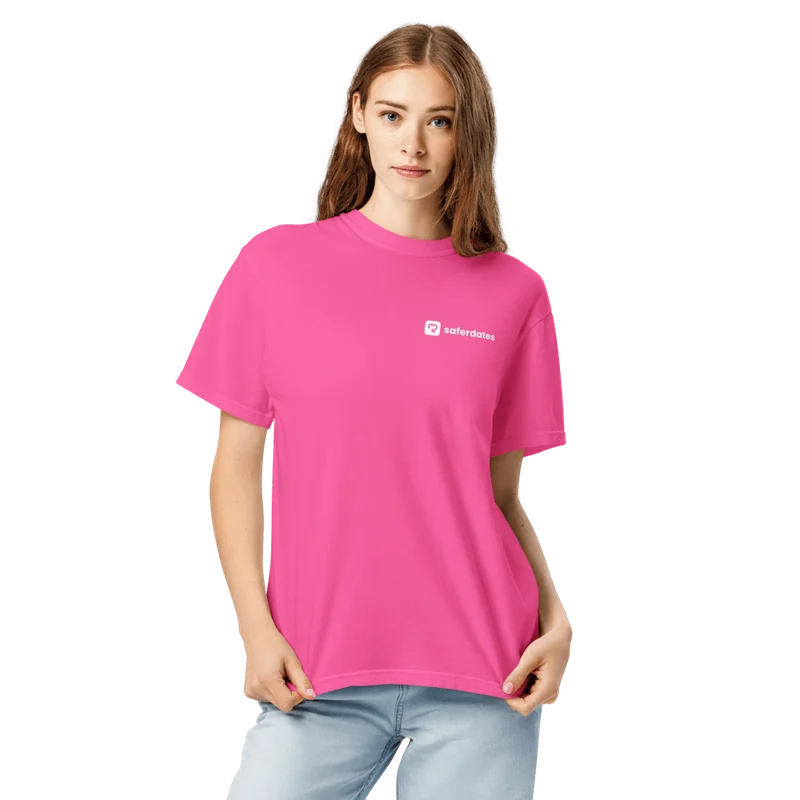 Neon pink heavyweight tee with a small saferdates logo