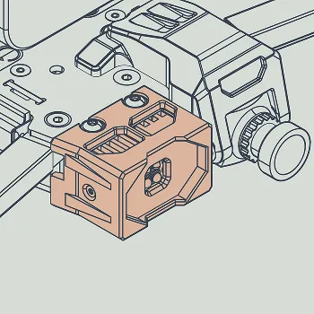 Detailed technical illustration of a mechanical assembly with a prominent orange rectangular component featuring slots and fastening points, attached to a metallic base with screws and a rotary knob on the side.