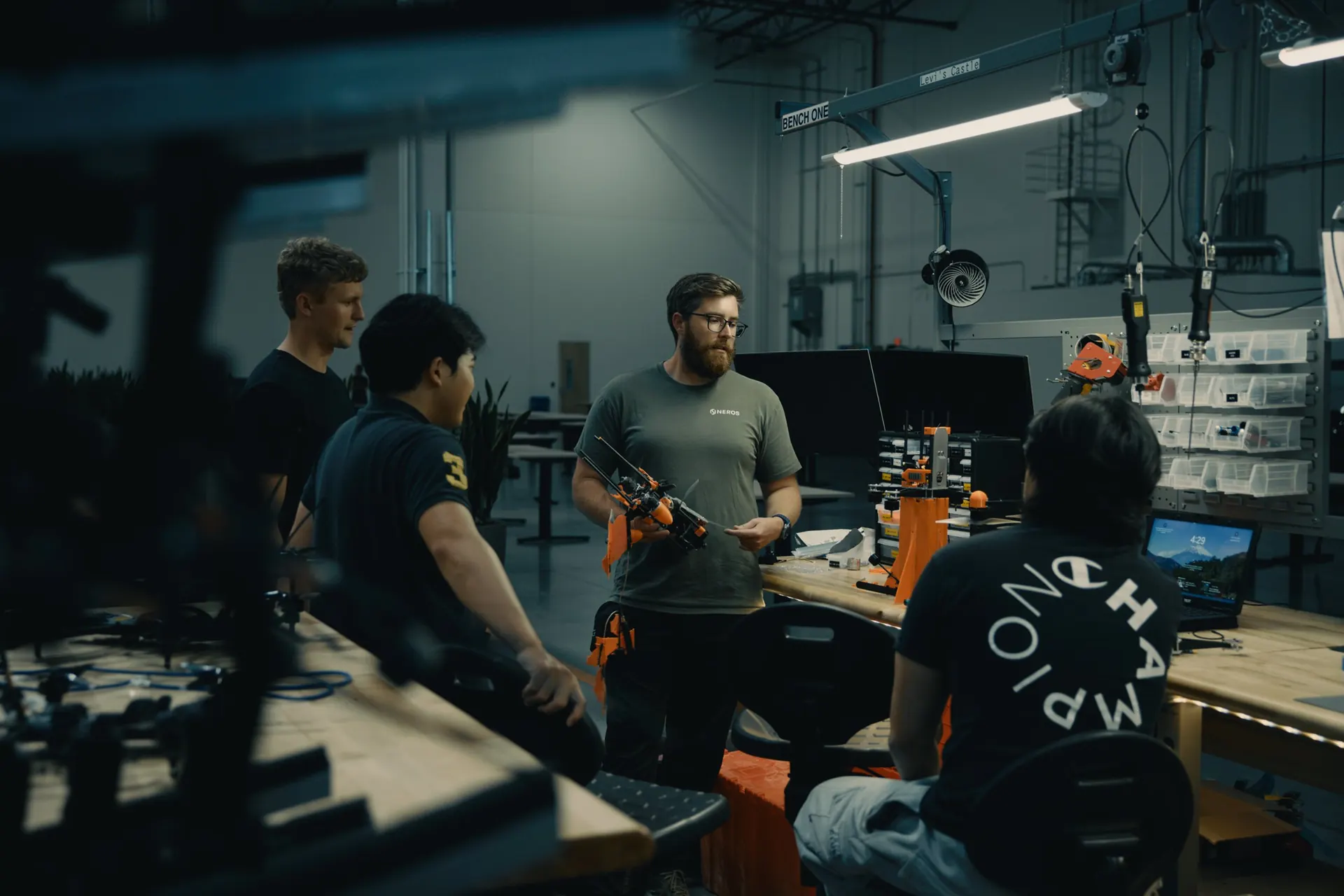Neros engineers at workbench.
