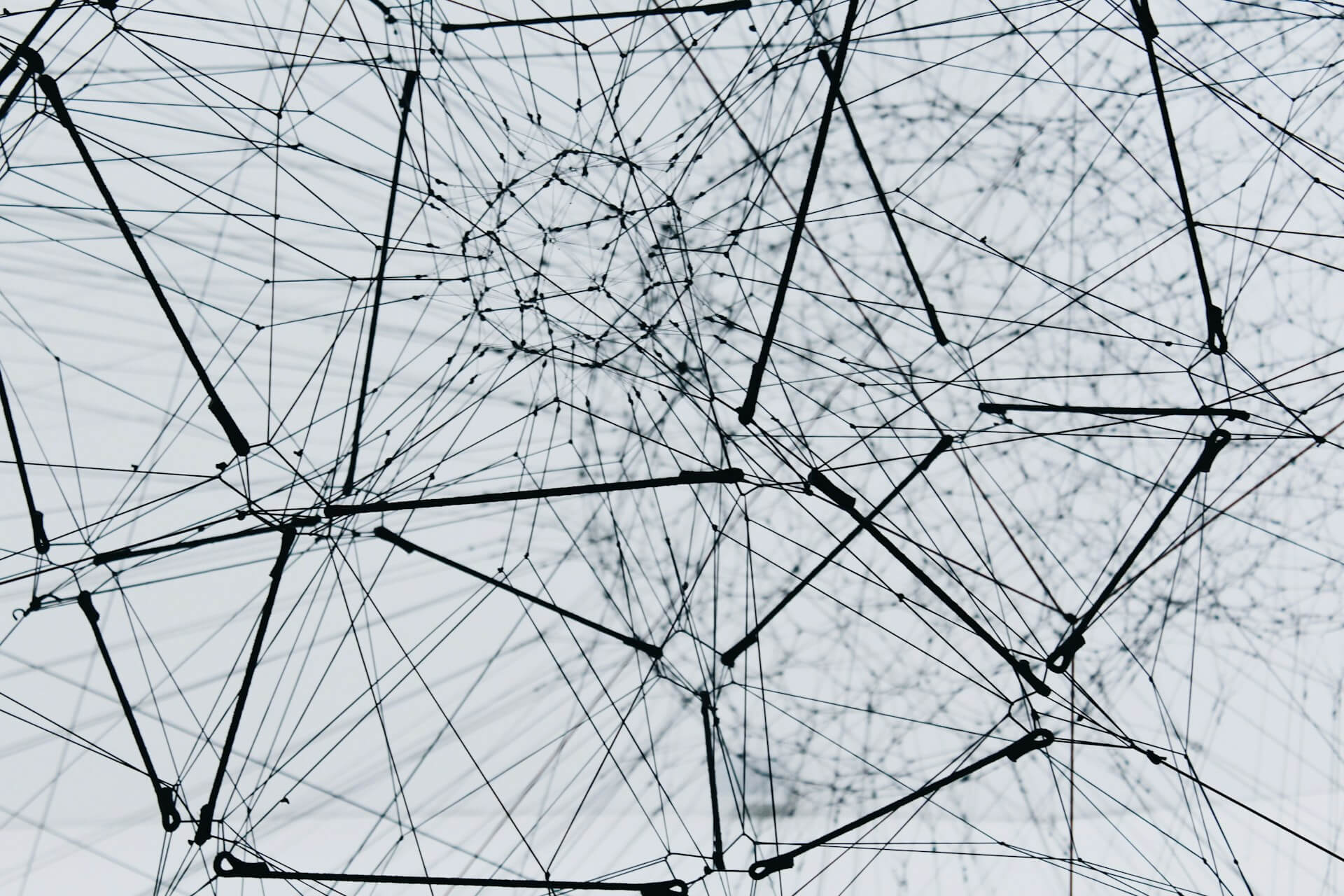Web of connected strands and nodes representing the data and infrastructure behind AI readiness