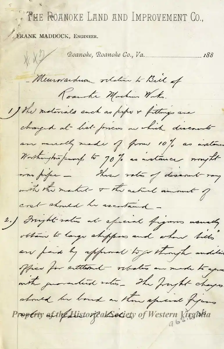 Handwritten memorandum on letterhead of The Roanoke Land and Improvement Co., authored by engineer Frank Maddock, discussing bills, materials, prices, discounts, and freight rates from Roanoke, Virginia.