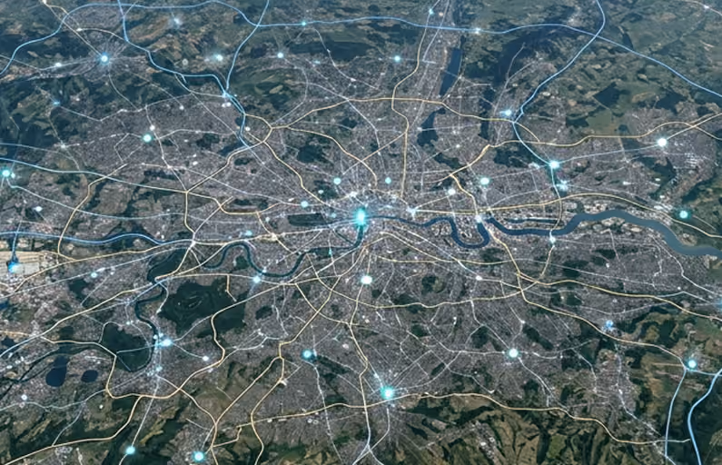 Satellite-style map of a city with highlighted roads and glowing blue connection points representing a network or data flow over an urban and green landscape.