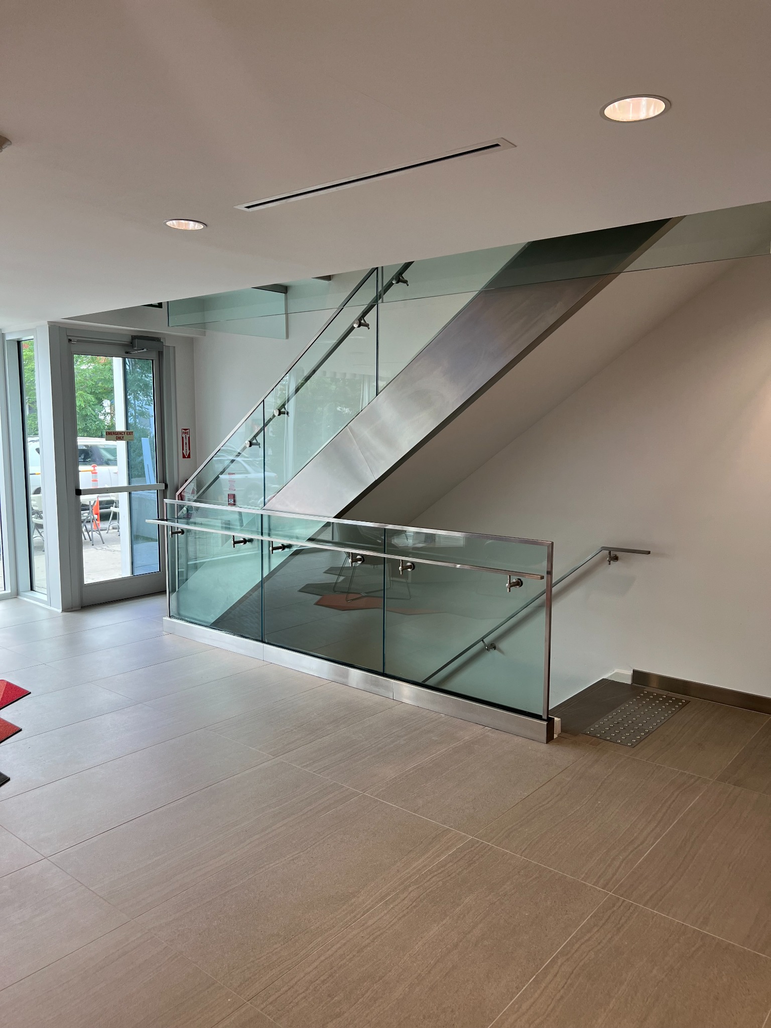 Architectural glass stair and guard system at the renovated Scotiabank branch