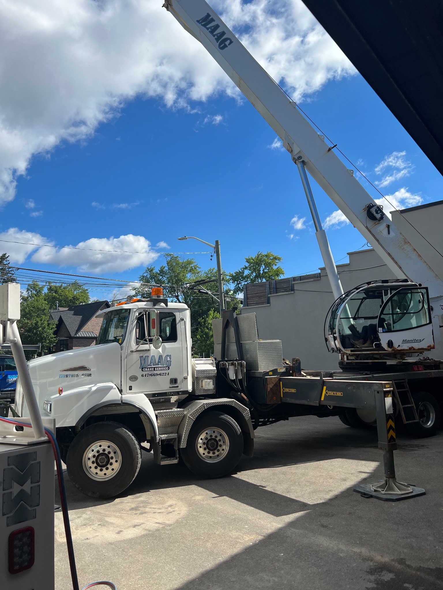 Crane operations during structural work at Scotiabank The Kingsway