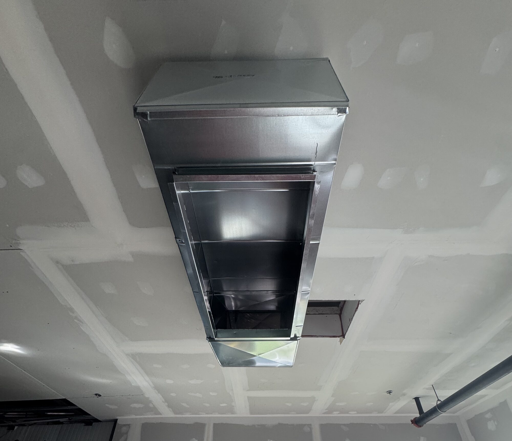 Supply-air ductwork through the new fire-rated ceiling