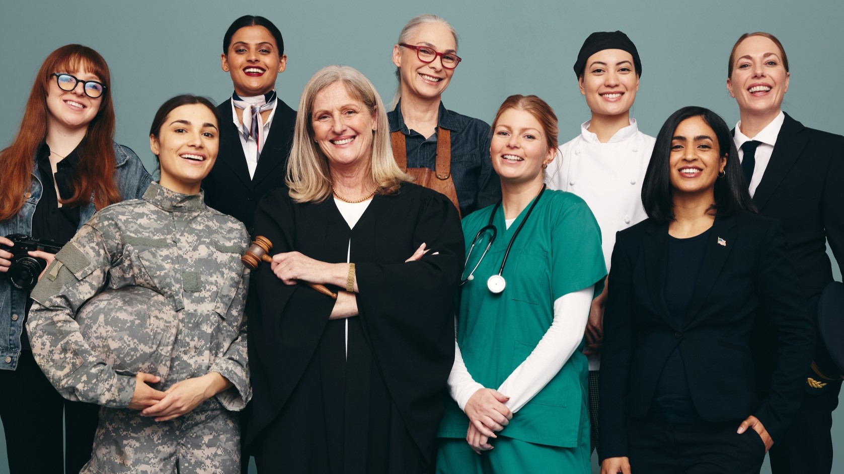 Professionals from many fields, including military, healthcare and legal, standing together