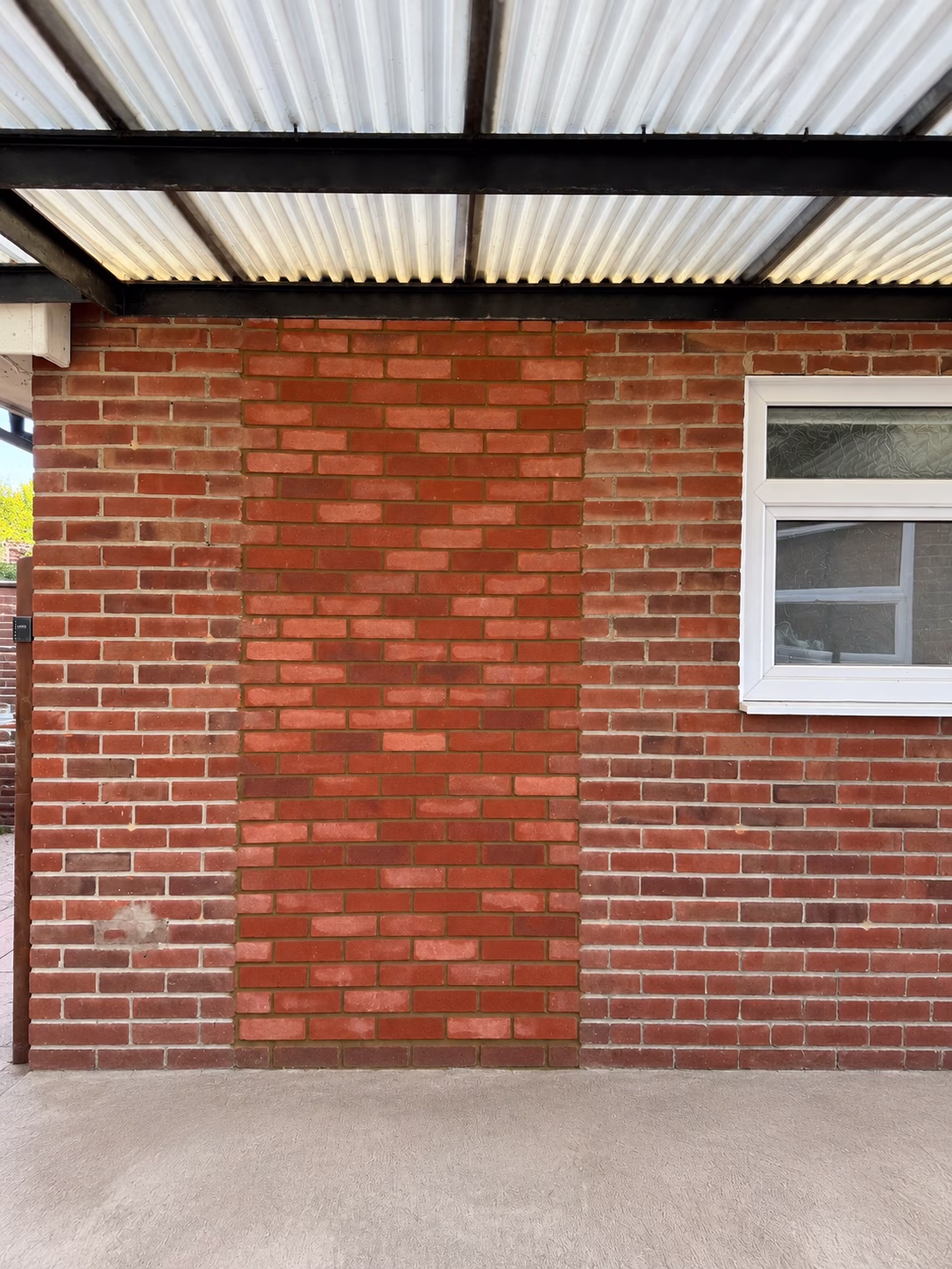Doorway fully bricked up and matched to the existing wall in Worthing