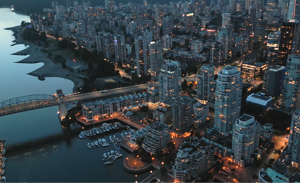 Aerial view of a city at dusk, representing the national strength and local touch of the Navacord case study.