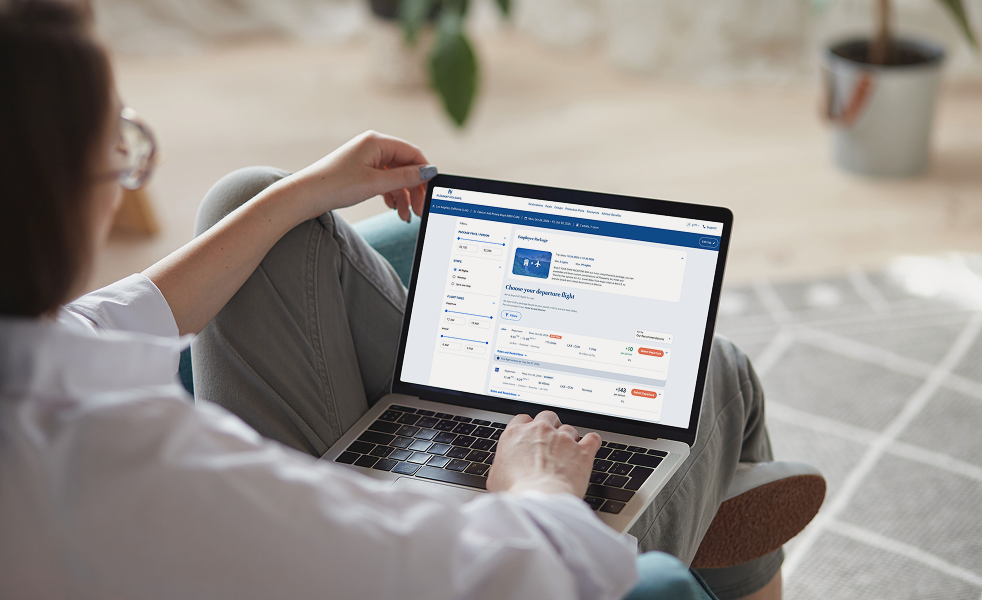A person using the modernized A|T Collective travel platform, a UX case study in creating intuitive customer hubs for complex journeys.