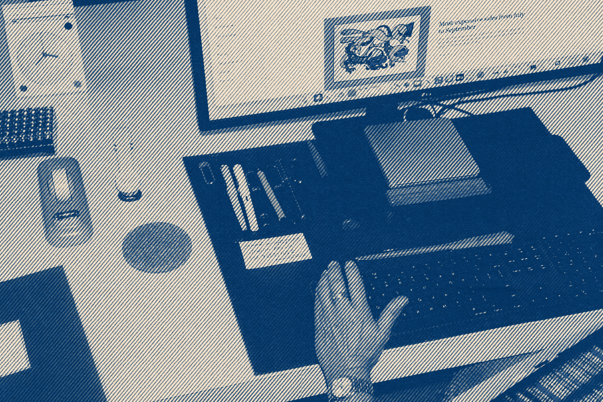 Overhead view of a desk with keyboard and monitor