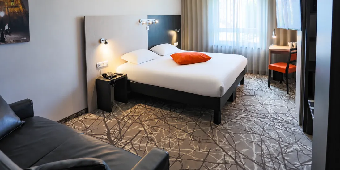 Chambre Exécutive de 30 m² avec grand lit dans l'aile récente de l'hôtel