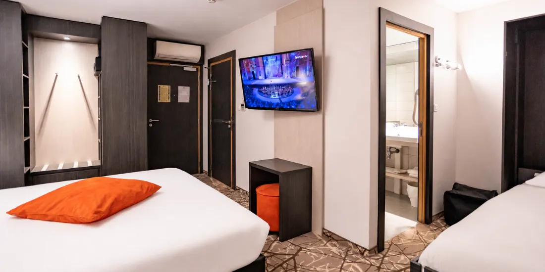 Grand lit et lit simple de la Chambre Privilège, à deux pas de Strasbourg