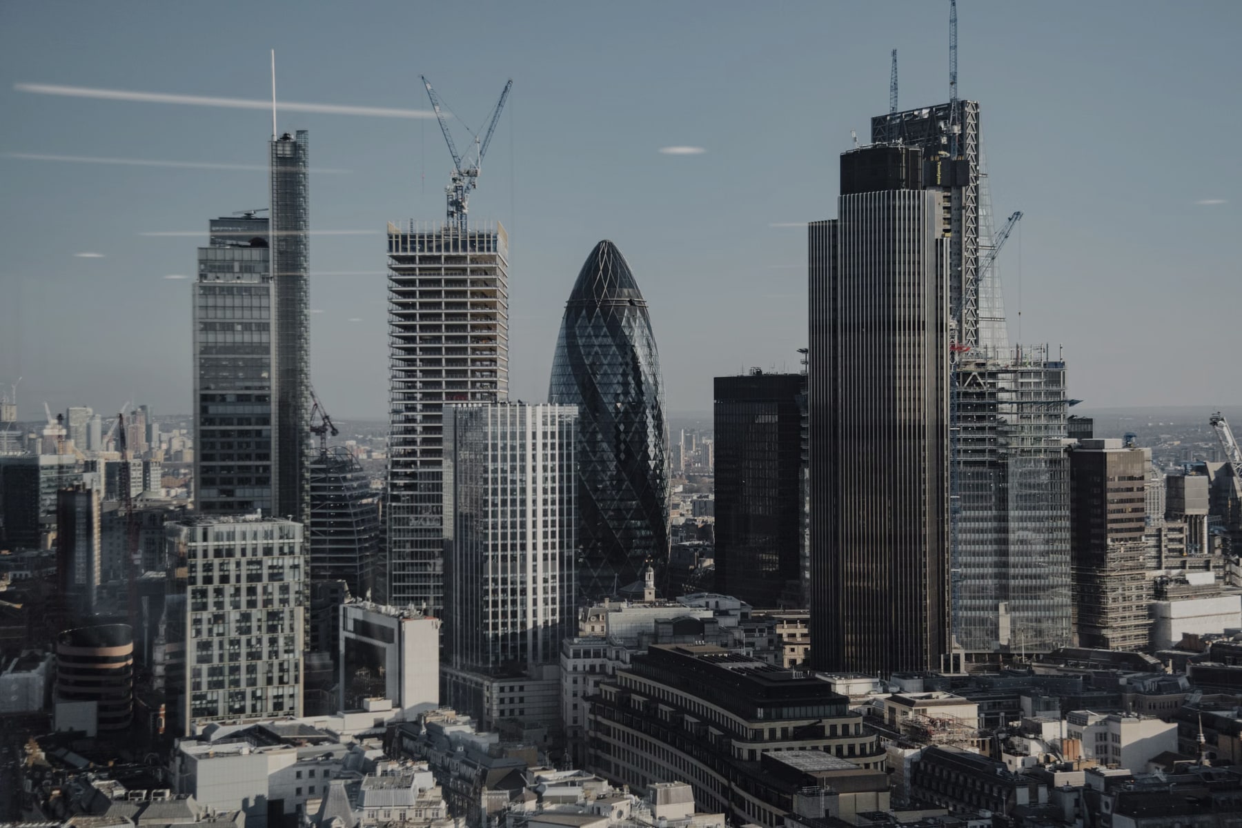City of London financial district with active construction and investment development