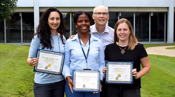 Center for Global Health Equity director Joseph Kolars with GH Research fellows