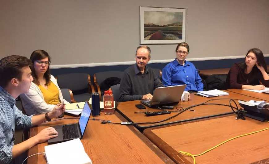 Williams with University of Michigan students and colleagues in a Complex Care team meeting in 2017
