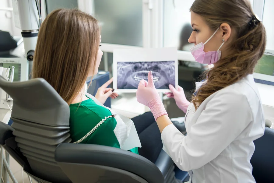 emergency-dentist-plainsboro-twp-dentist-reviewing-xray-with-patient