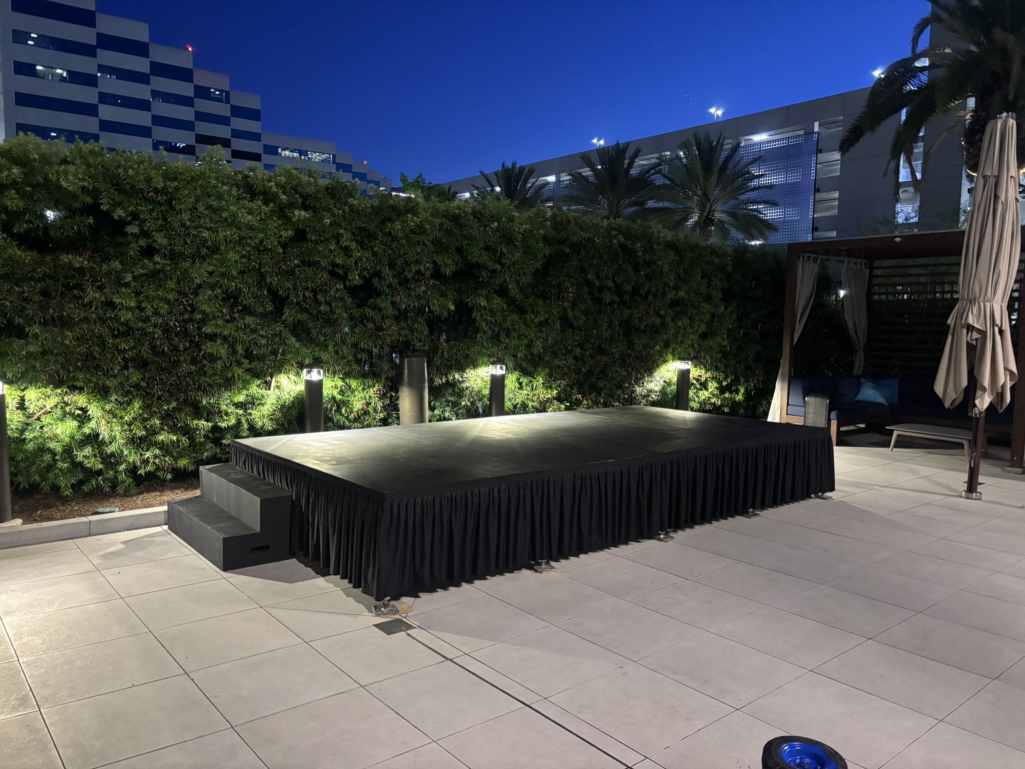 [background image] image of stage with seating (for an author & writer)