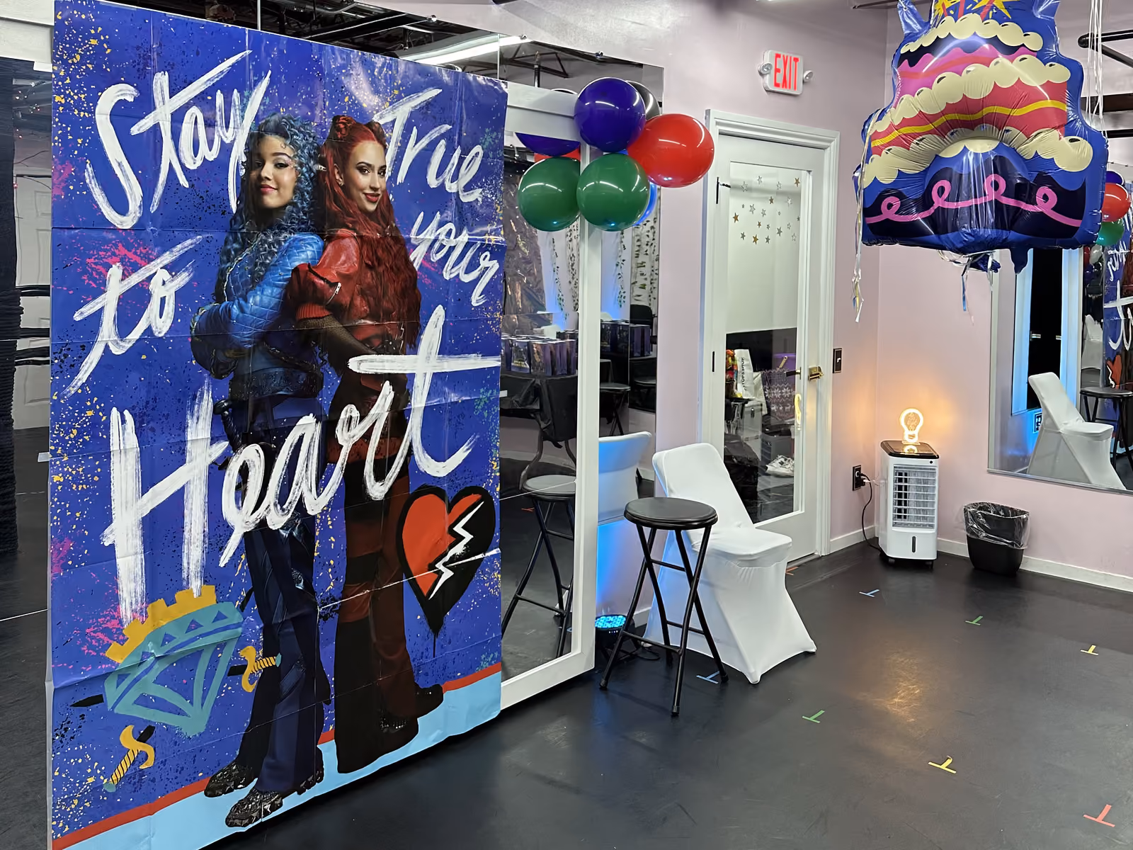 Birthday party backdrop and balloons set up in the Revolution Dance Academy studio in Tenafly, NJ