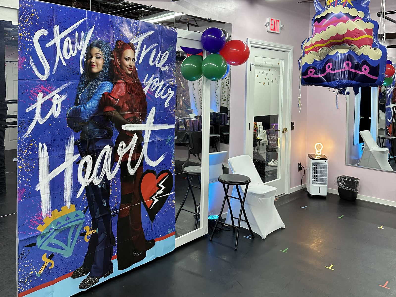 Birthday party backdrop and balloons set up in the Revolution Dance Academy studio in Tenafly, NJ