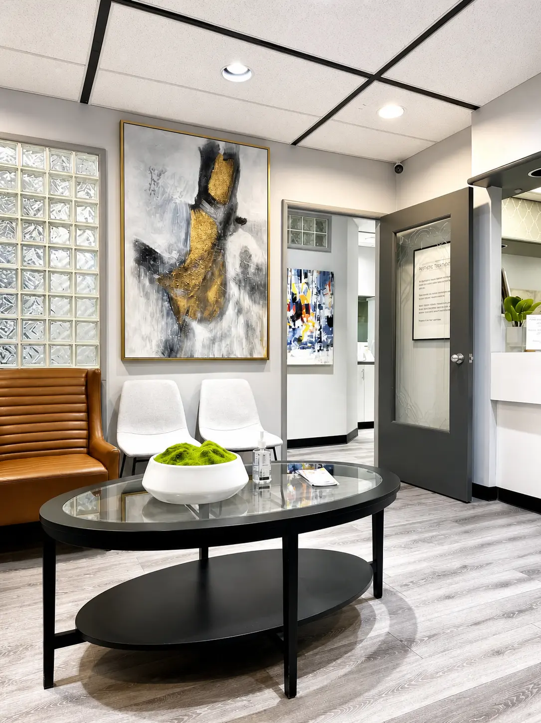 Waiting room with modern artwork at Macleod Trail Dental