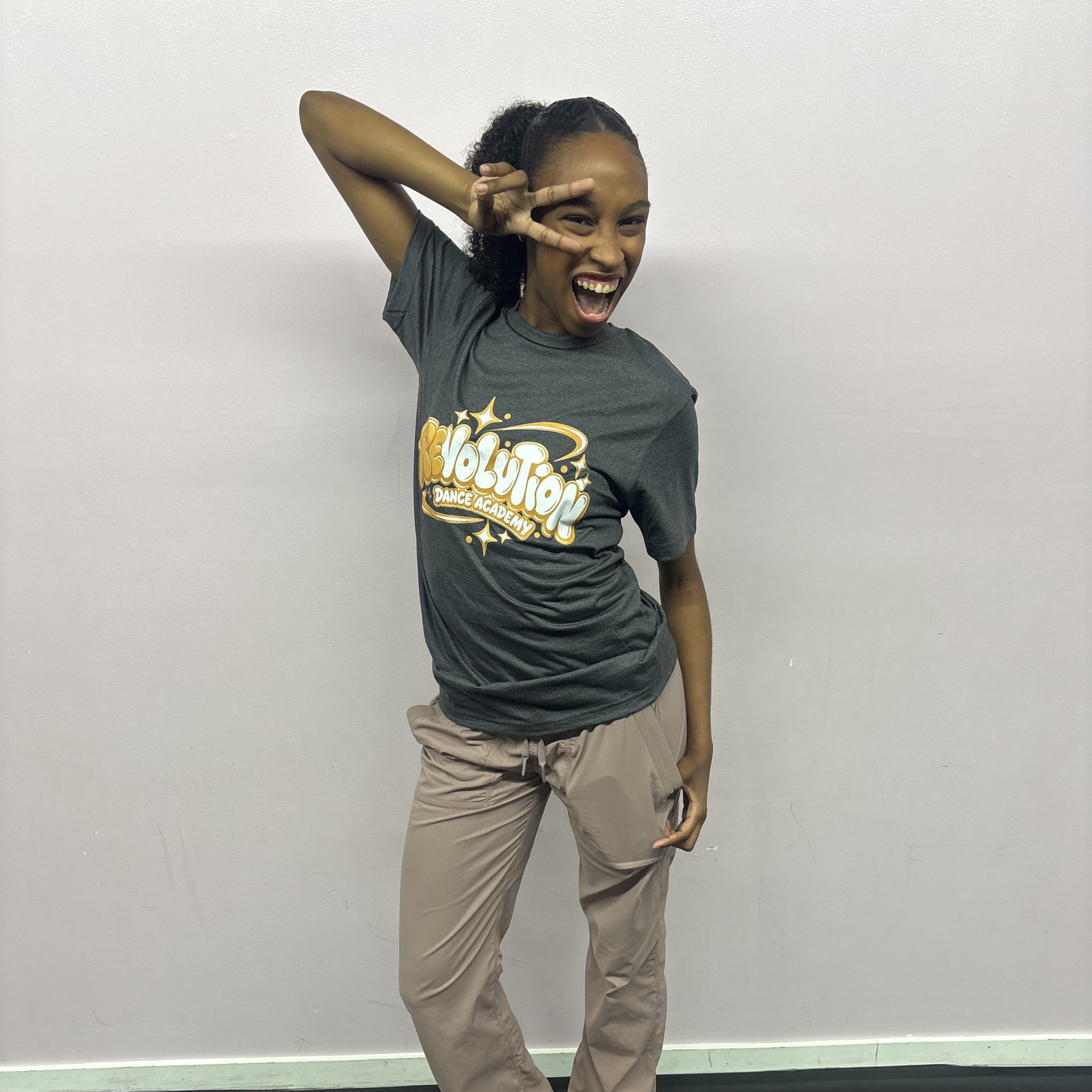 Skyler James striking a playful pose in the Revolution Dance Academy studio