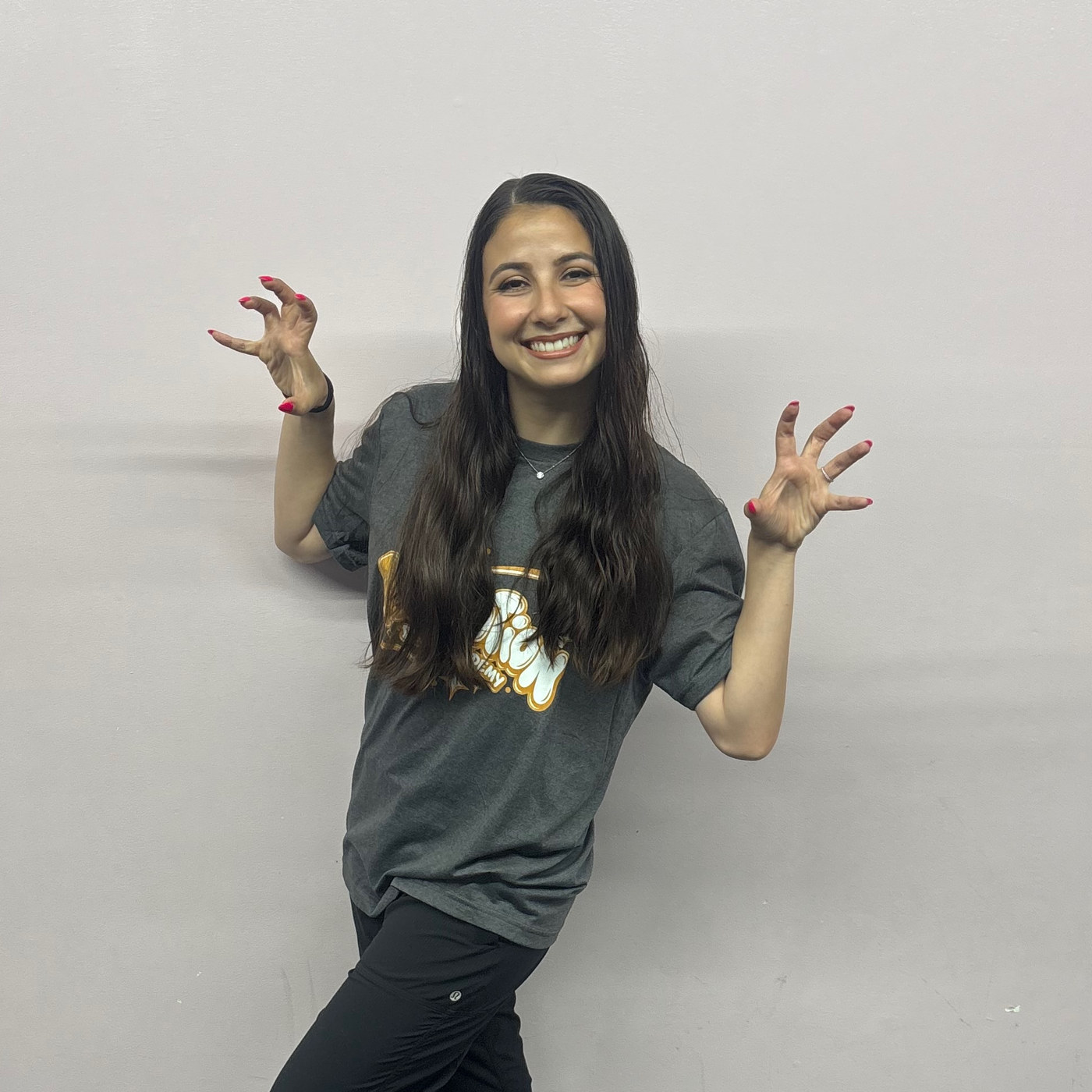 Rachel Bernstein, co-owner of Revolution Dance Academy, striking a playful pose