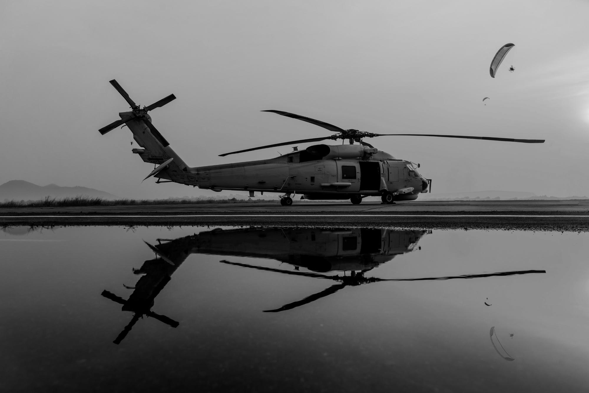 Rotor-wing crew on the pad at dusk