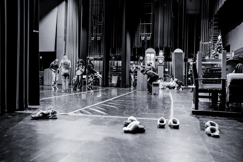 Candid moment backstage during a performance